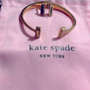 Ring and bracelet set, gold color.